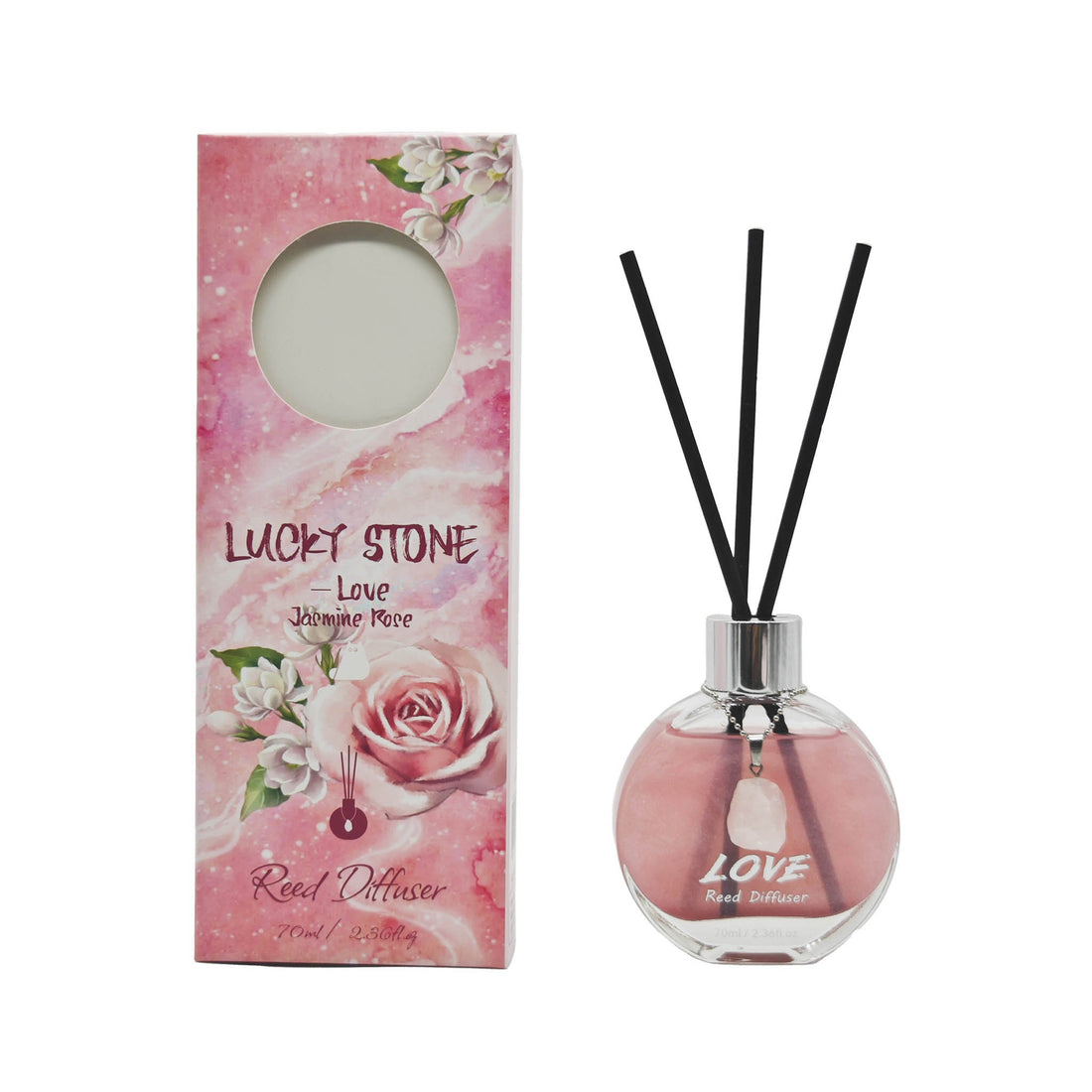 Reed diffuser set with pink glass bottle, three black reeds, and crystal pendant