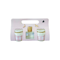 Reed diffuser bottle set with two striped scented candles, boxed with gold reeds