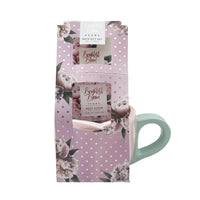 Brightest Bloom gift set bag with window showing body scrub jar and pink mug.