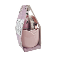 Pink body care bottle and mug set in open gift box with pink liner