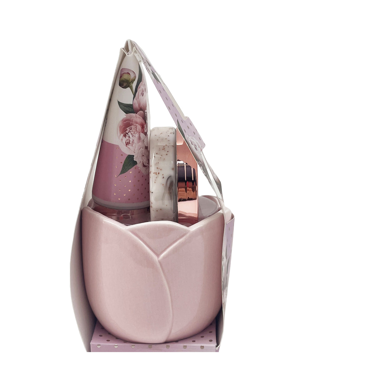Tulip-shaped pink mug with body care bottles in floral gift box