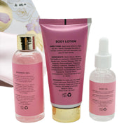 Bath care set bottles and body lotion tube with gold caps and pink labels
