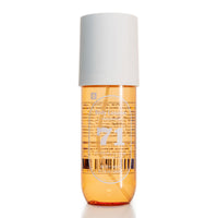 240 ml body mist bottle with amber liquid and white cap, front label close-up