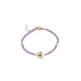 Purple Beaded Bracelet with Four-Leaf Clover Charm