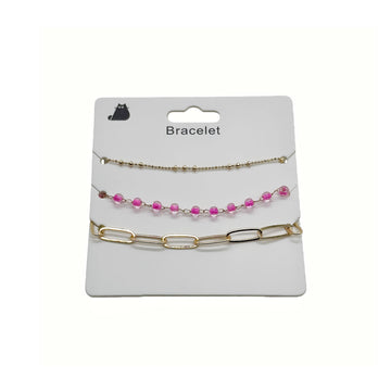 Gold-tone bracelet with pink beads and chain link segments