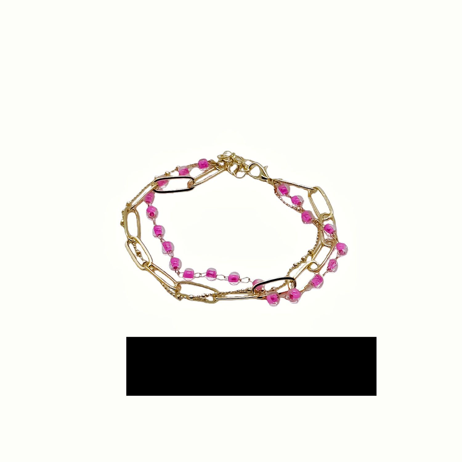 Gold-tone beaded bracelet with link segments and lobster clasp