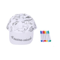 White printed cap with sea creatures pattern and fabric marker pens, side view