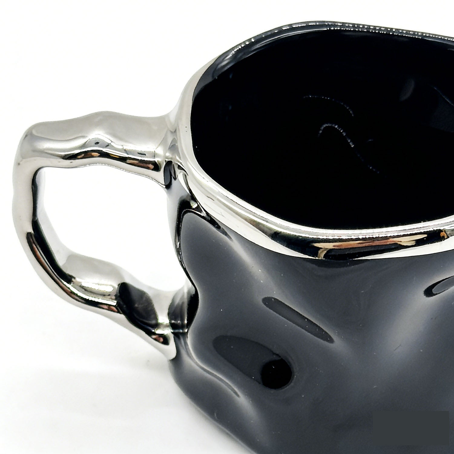 Ceramic cup with modern metallic handle design 2