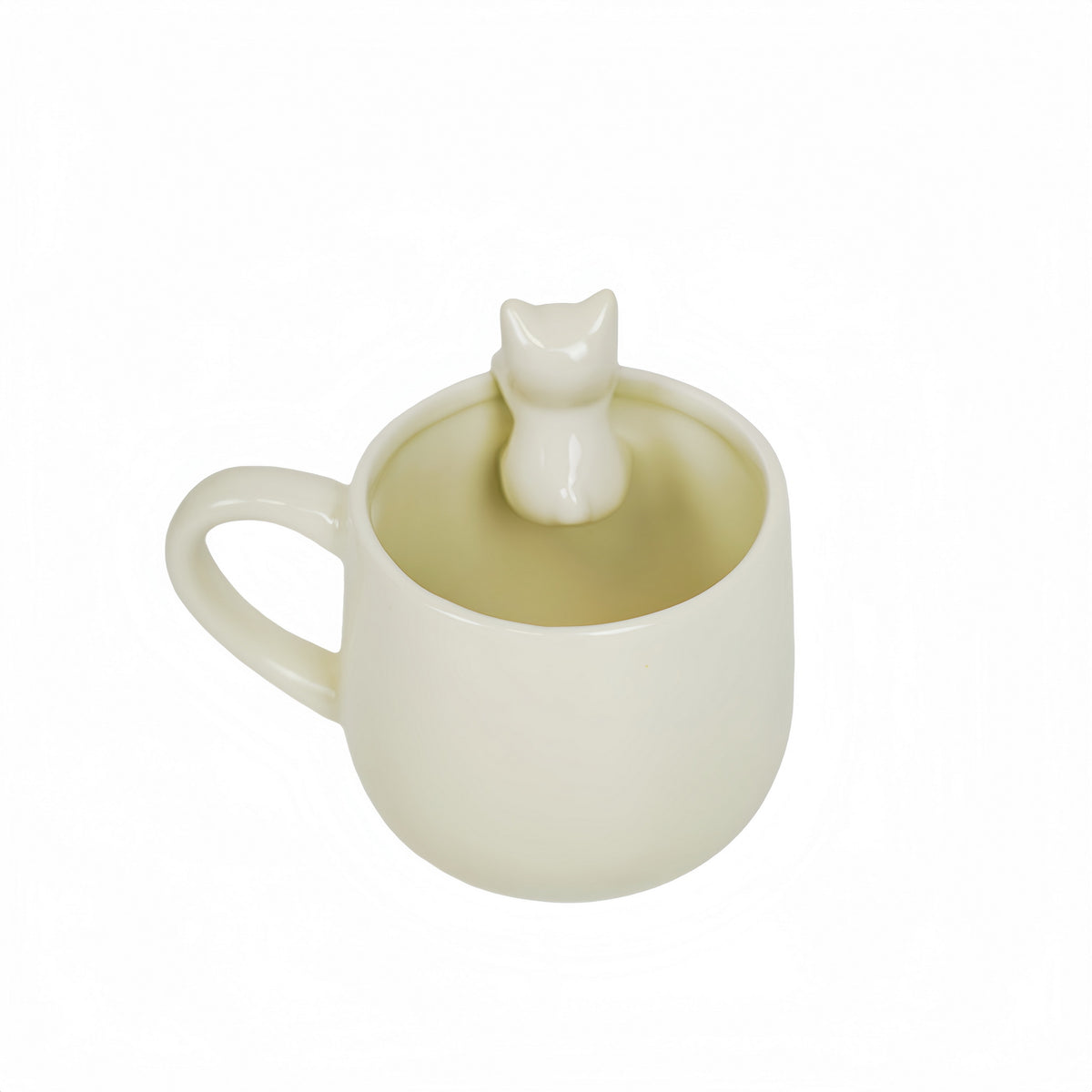White ceramic mug with cat topper figurine and open cup interior.