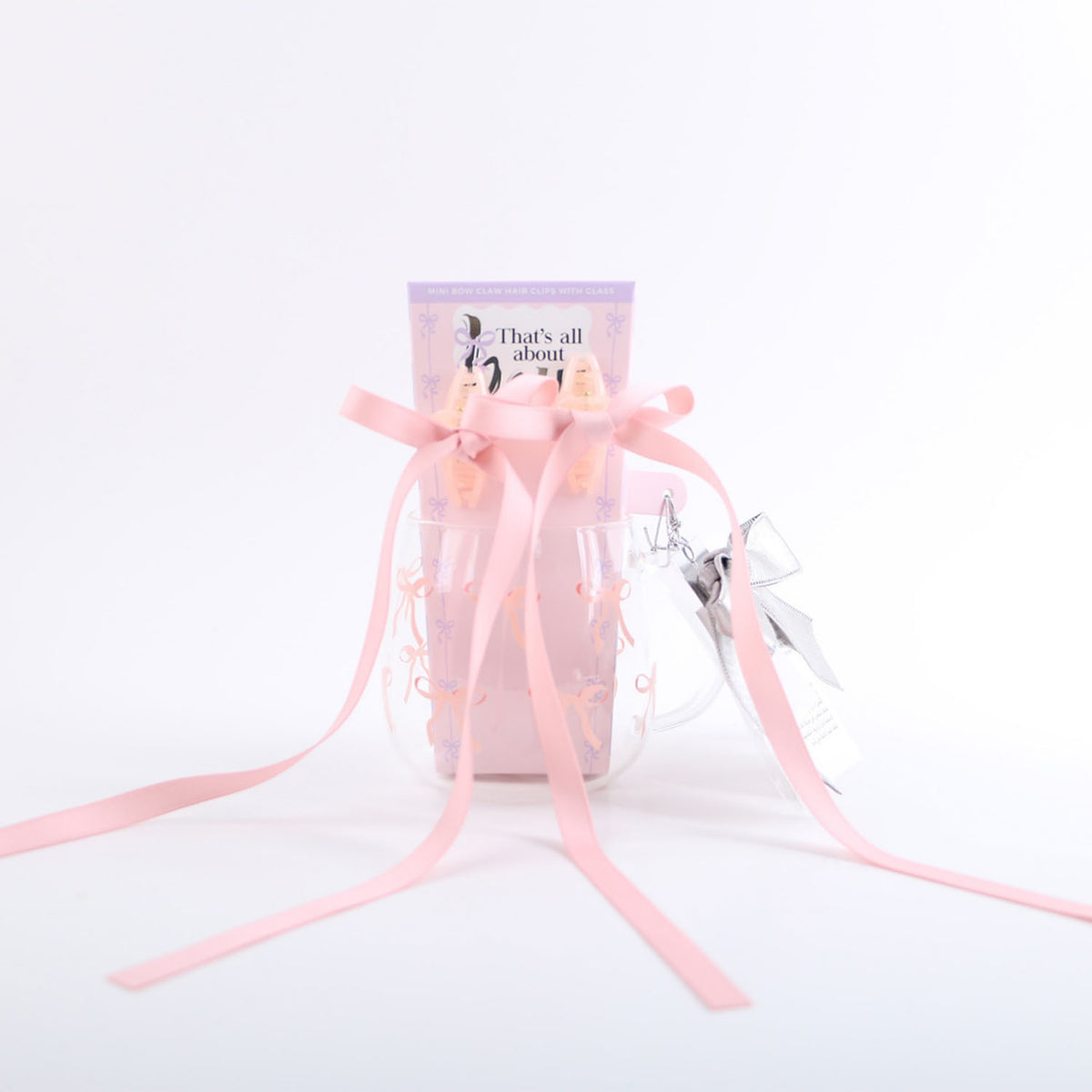 Glass cup gift with pink ribbon bows and silver hair clips, three-piece set