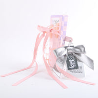 Glass cup gift with pink ribbons and silver bow hair clips, set of three