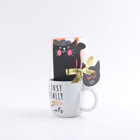 Cat ceramic mug with gift box and gold ribbon bow, white mug with 'I JUST REALLY Cats' text