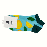 Light blue socks with fruit pattern; green toe and heel
