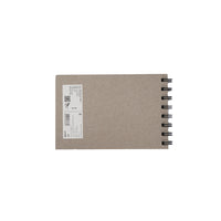 Small spiral notebook back cover with product label and black spiral binding