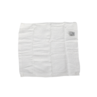 White facial cleansing cloth with small printed logo on corner