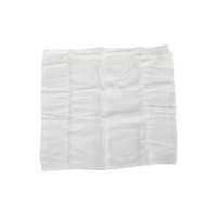 White facial cleansing cloth, folded square with textured surface