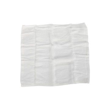 White facial cleansing cloth, folded square with textured surface
