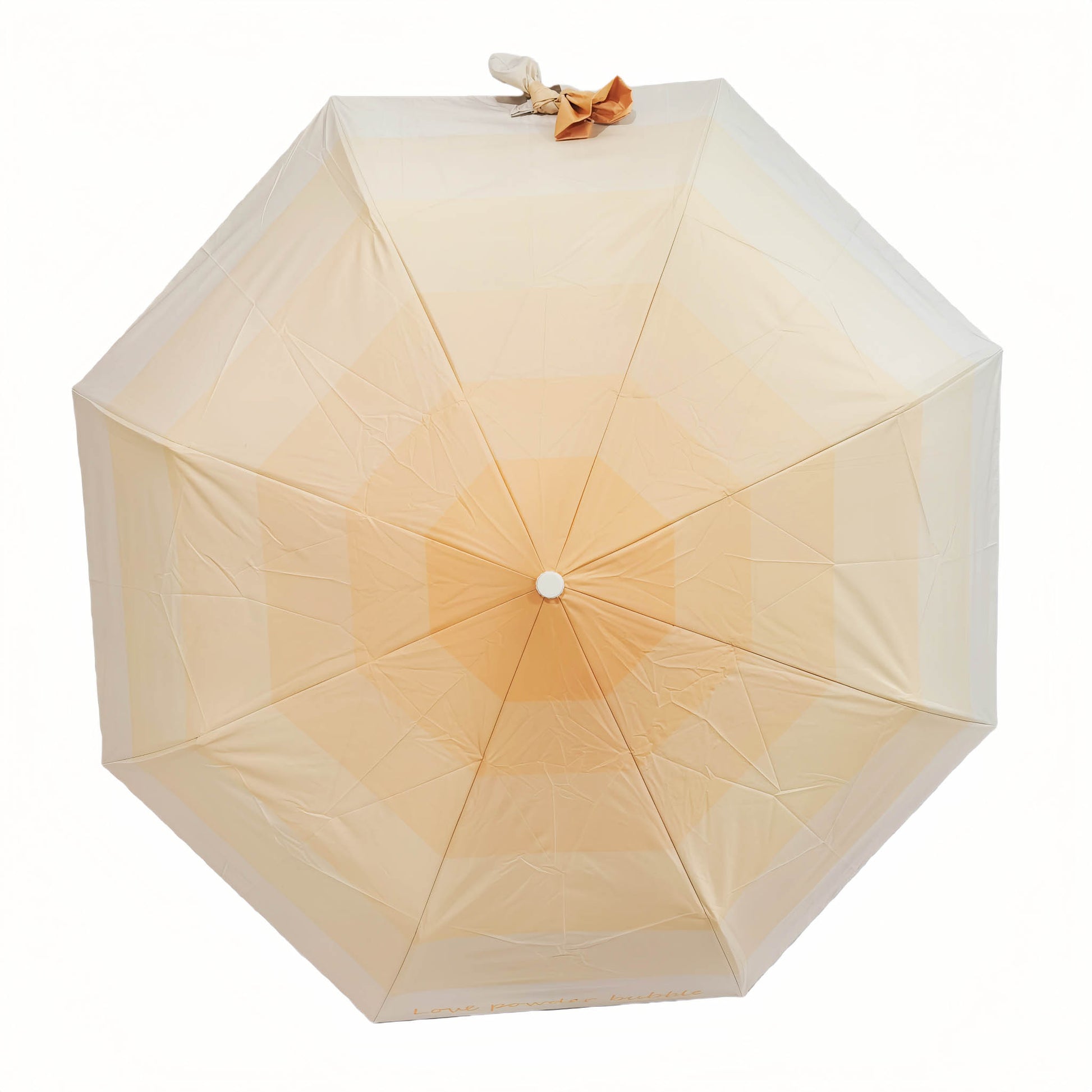 Folding umbrella, ivory canopy with small tied top bow and centered hub.