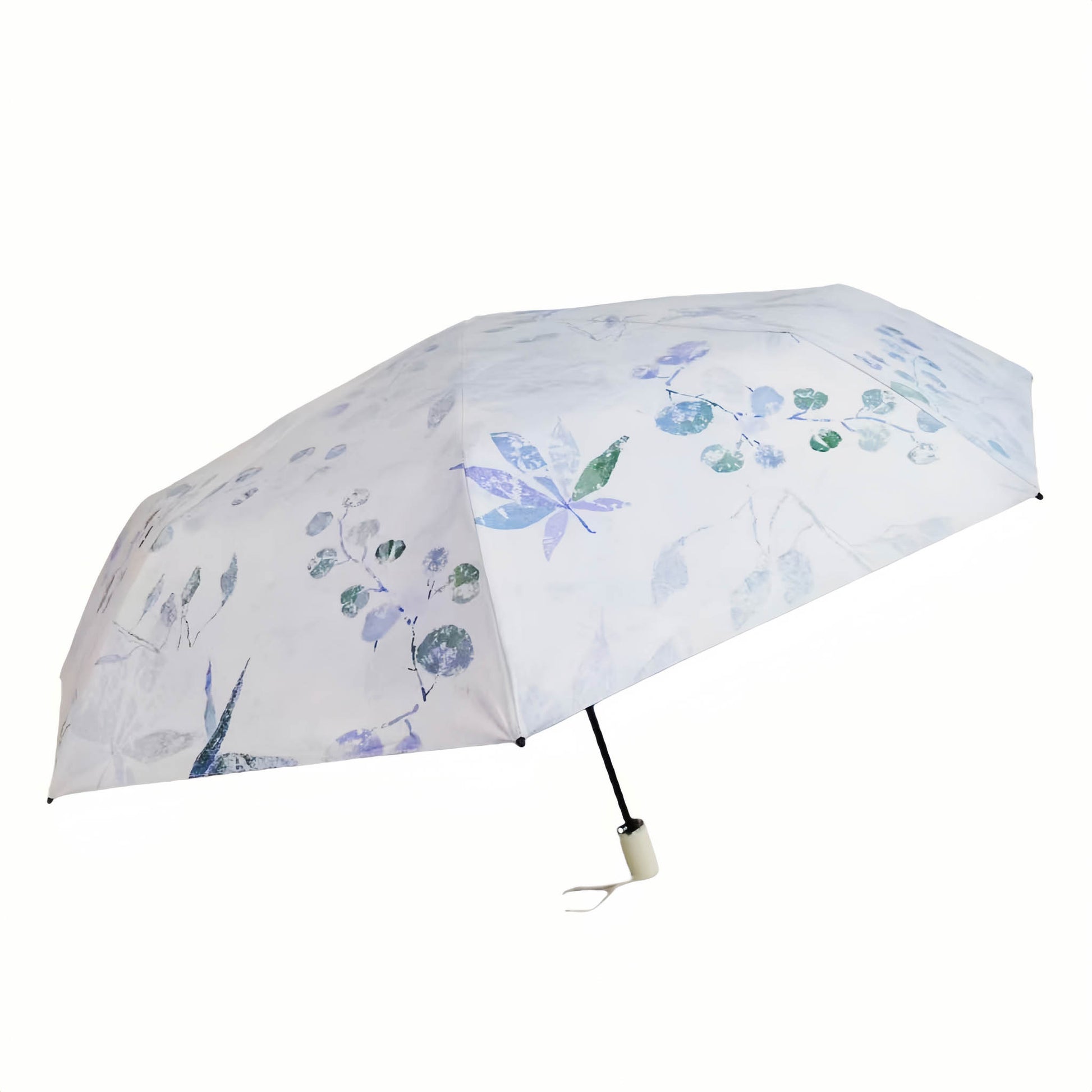 Folding umbrella with white fabric and blue-green floral pattern, round button center