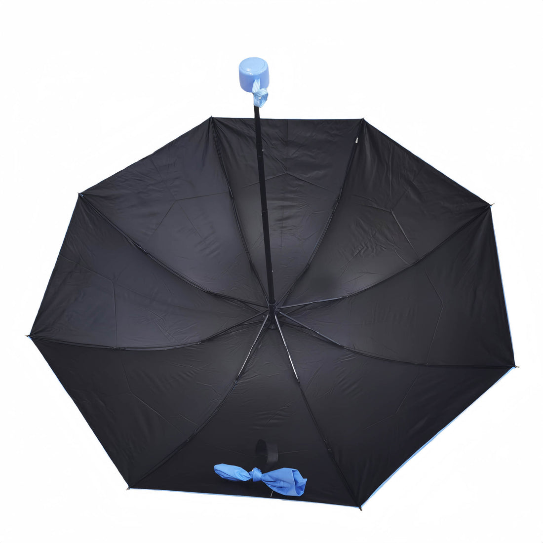 Folding umbrella, dark navy canopy with blue handle and storage pouch