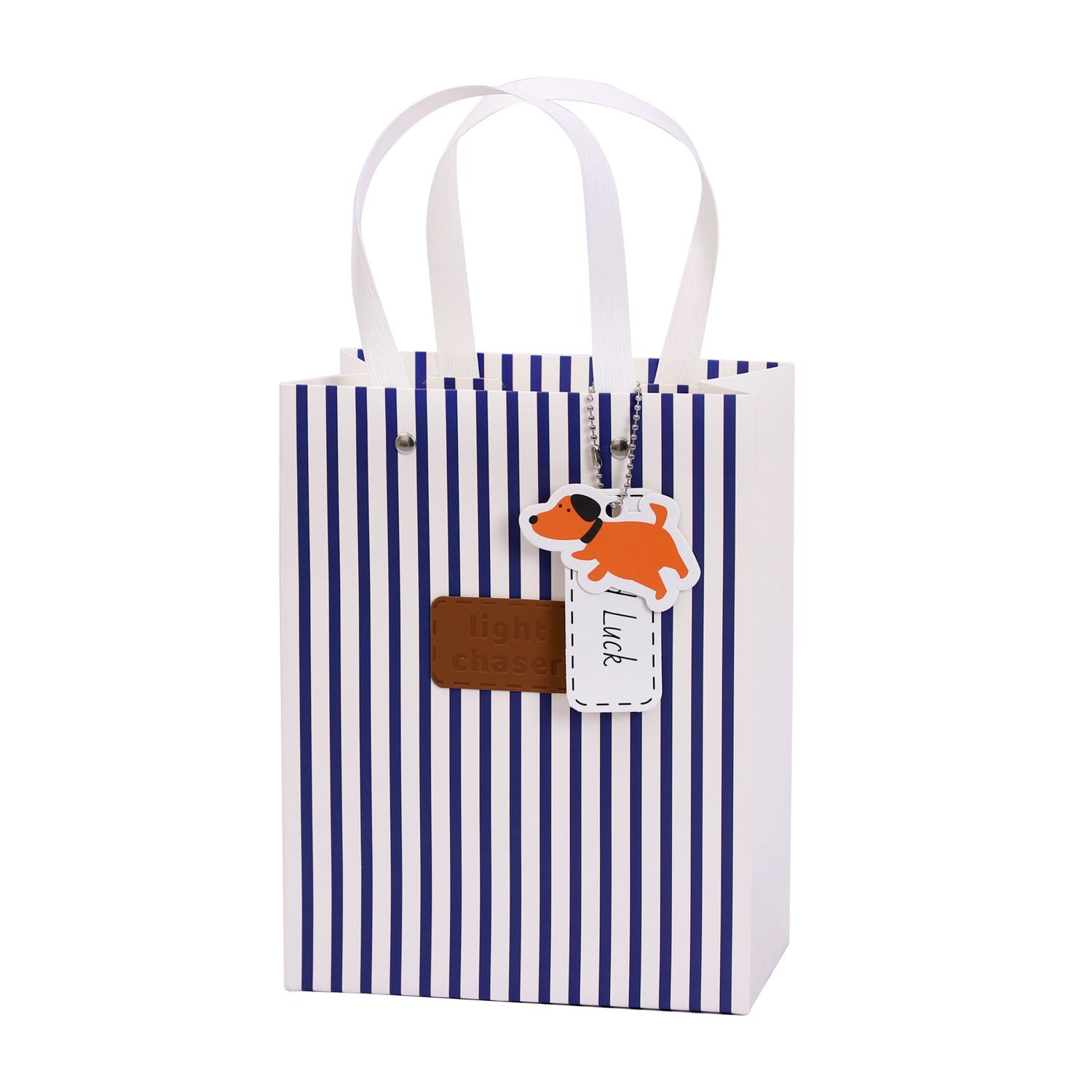 Striped gift bag with white handles and dog charm tag