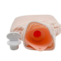 Hot water bottle with striped cover and orange valve with red cap, 1L