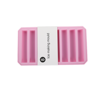 Pink silicone ice cube mold tray with central “ice making mould” label strip