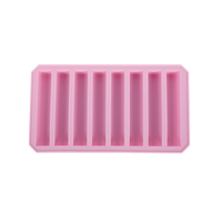 Pink silicone ice mold tray with evenly spaced vertical slots
