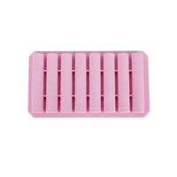 Pink silicone ice cube mold tray with multiple vertical channels