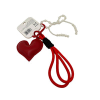 Heart key chain with red leather heart, black cord wrap, silver chain tassel