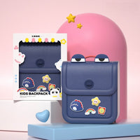 Navy silicone kids backpack with front flap pocket and animal rainbow charm patches