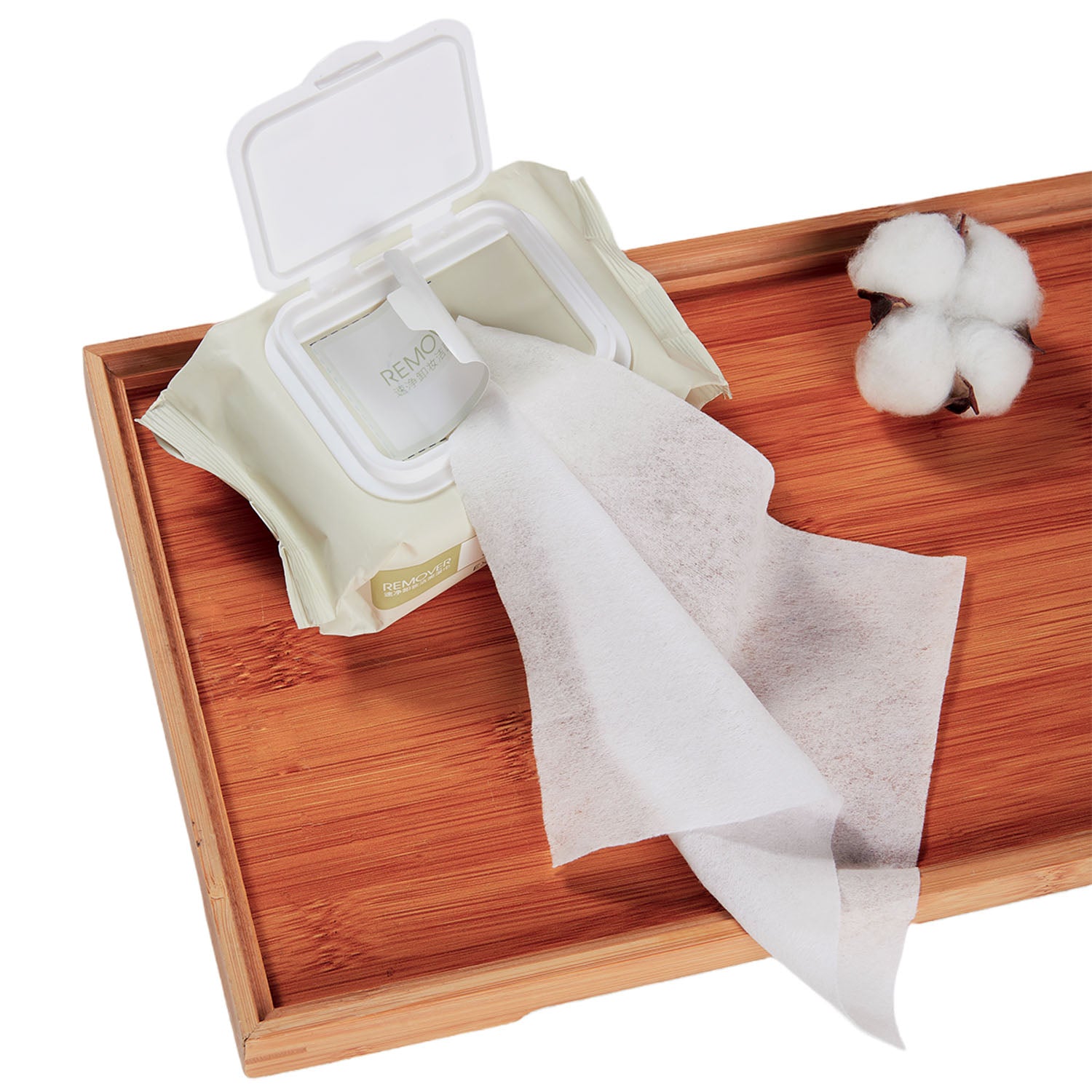 Makeup remover wipes pack with open lid and cotton ball accessory