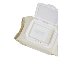 Makeup remover wipes in open case with one wipe pulled out