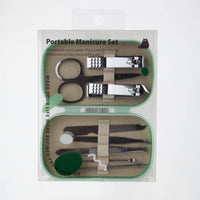 Manicure tool set in mint case with multiple metal nail tools and storage slots