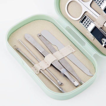 Manicure tool set in mint plastic case with beige pouches and metal nail tools