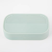 Mint portable manicure case with ribbed lid and smooth front panel