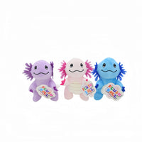 Set of three plush toys: purple, pink, and blue, each with a smiling face and card