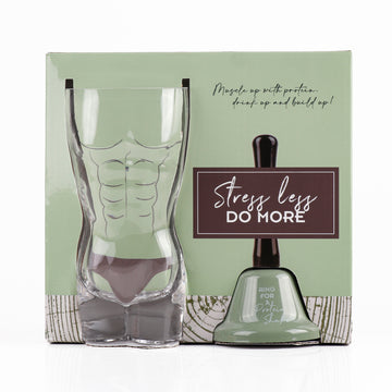 Clear glass cup with green base and black bell-shaped protein shaker accessory