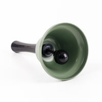 Green bell-shaped shaker base with black inner cap and short handle