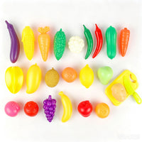 Set of colorful plastic toy foods, including fruit and vegetable pieces