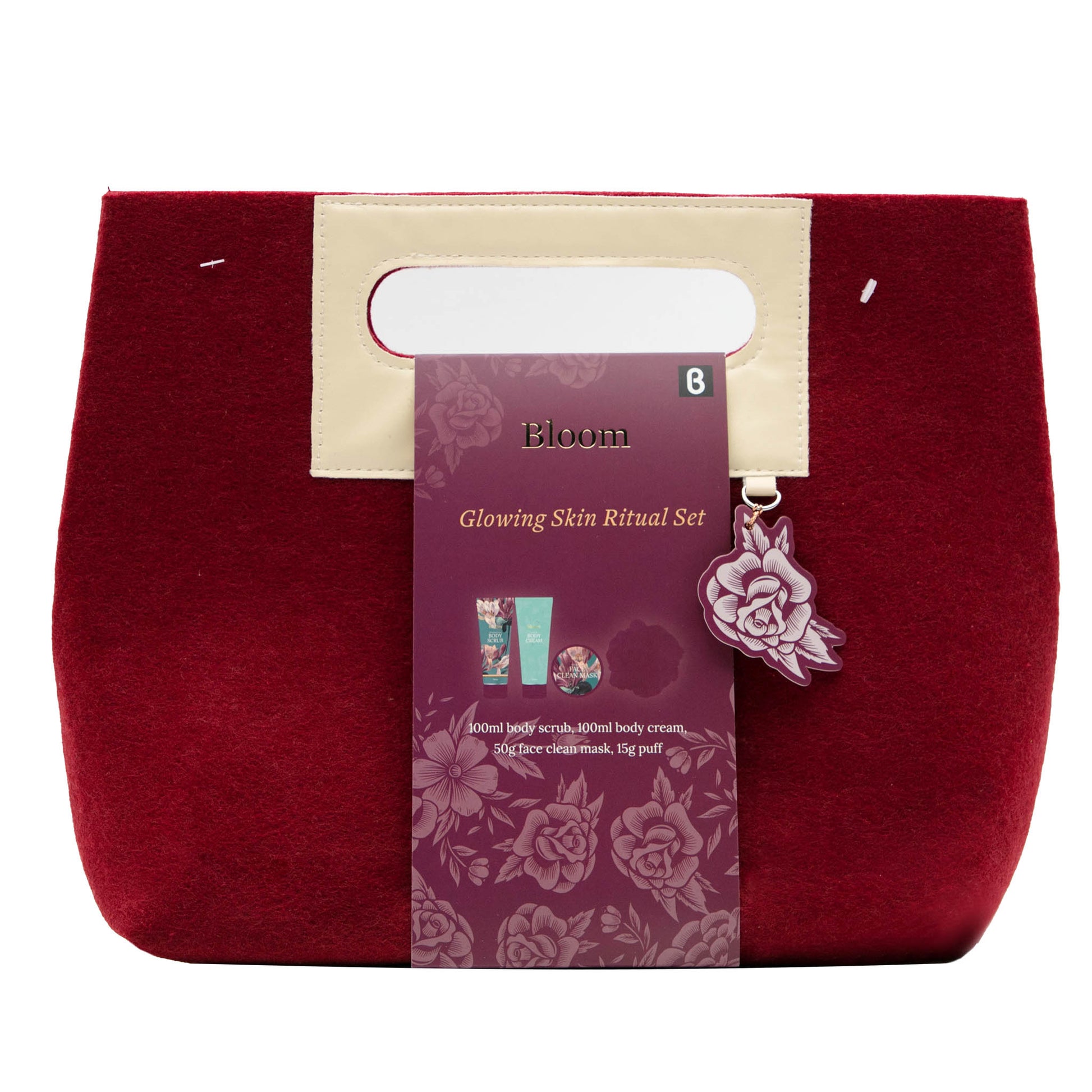 Burgundy felt cosmetic pouch with Bloom label and floral charm, glowing skin set