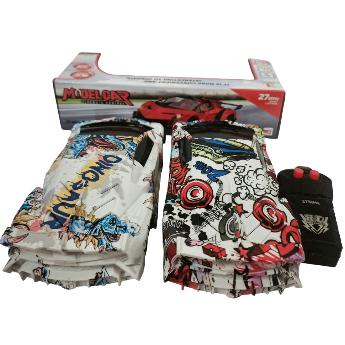 Remote control toy car set in box: two patterned shells and black handheld remote