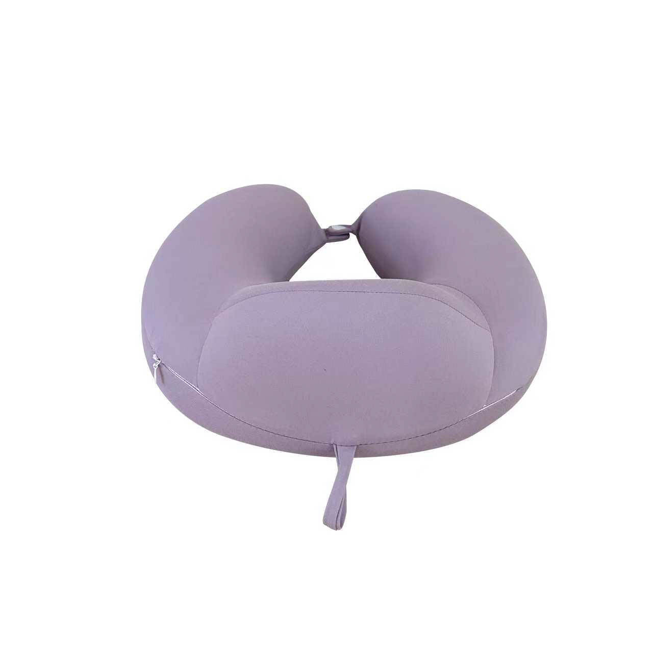Light purple travel pillow with split center opening and hanging drawstring