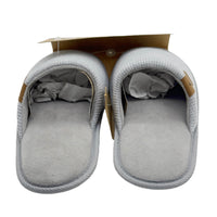 Women's slip-on slippers with light gray knit upper and soft gray insole, tops open