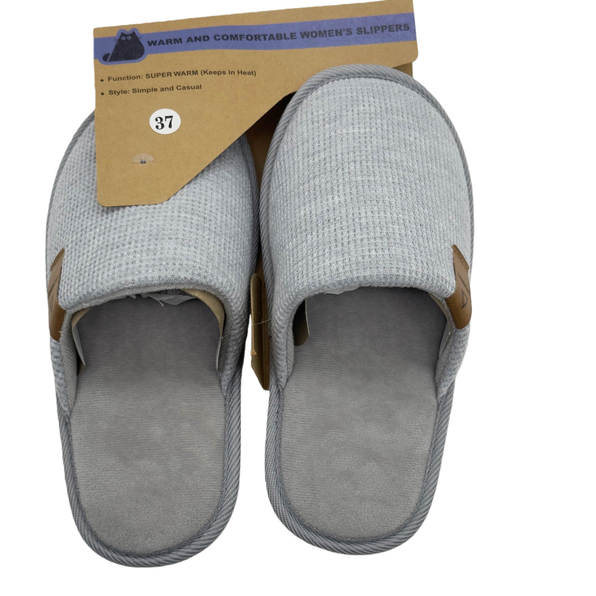 Women's slip-on slippers in light gray knit with tan trim and soft gray lining