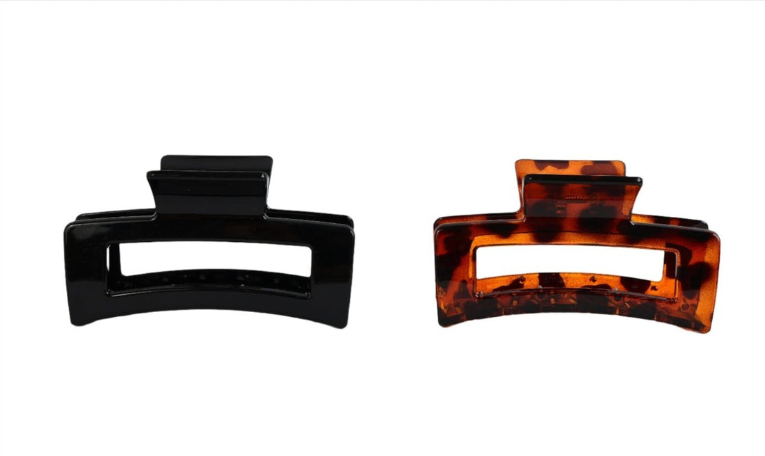 Adult claw clips, black and brown; wide top hinged grip.