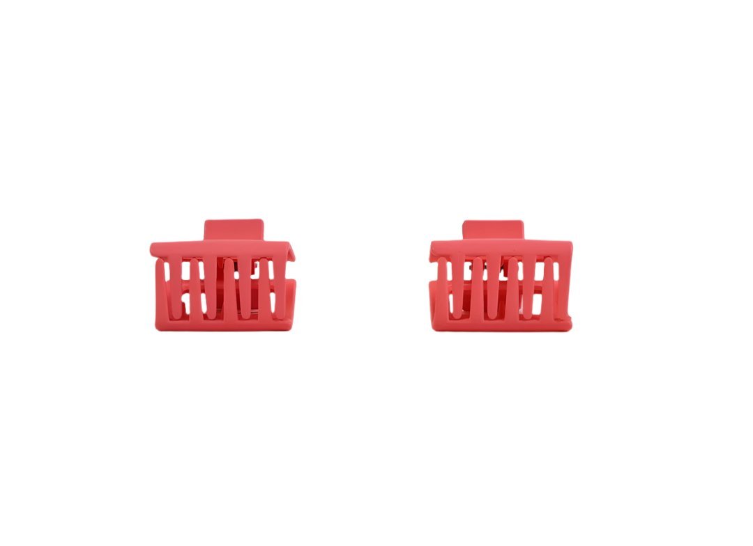 Set of small pink hair clips with vertical comb prongs, two-pack