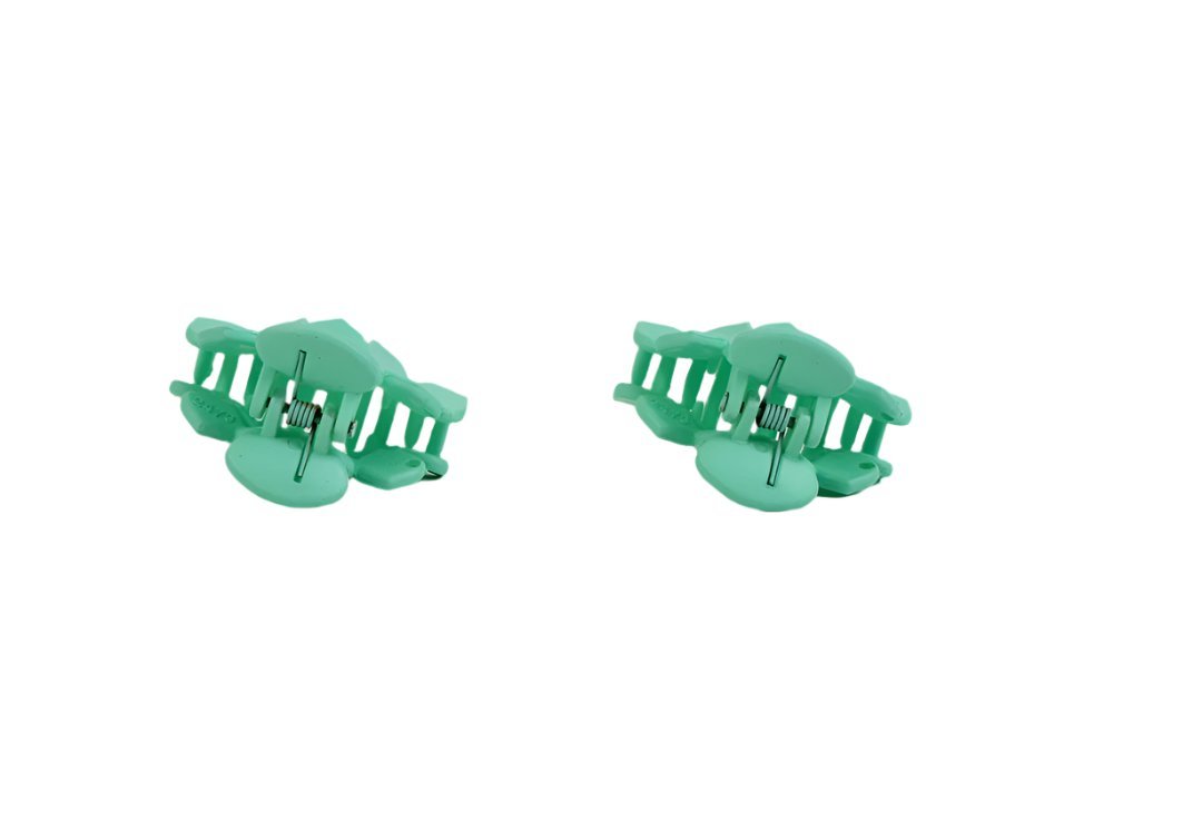 Adult claw clip, mint green, side view with ridged teeth