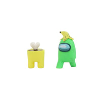 Two crewmate figures: yellow with white antenna top and green with star head accessory