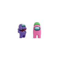 Among Us crewmate figures: purple crewmate with jagged mouth, pink crewmate with green cap